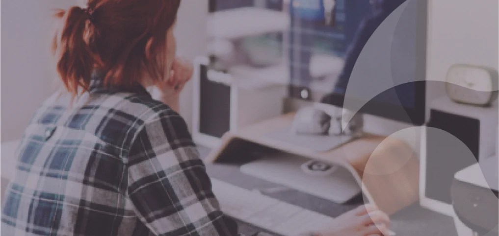 a woman working at her desk