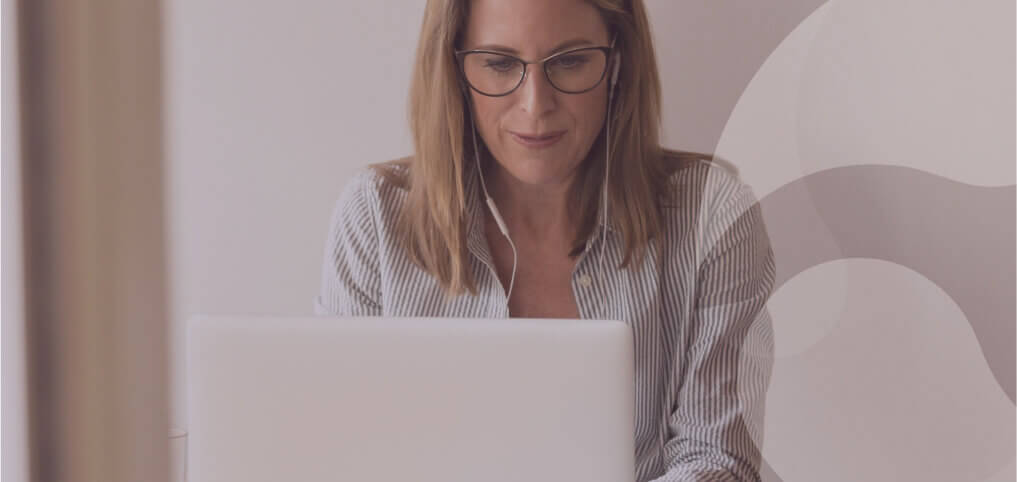 woman typing on a laptop