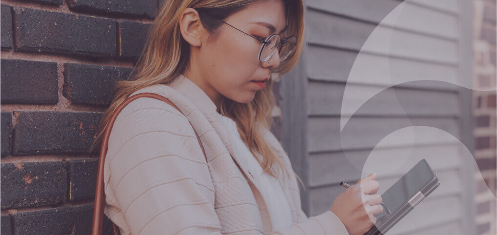 girl typing on a phone