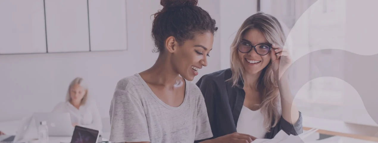 two business woman reading