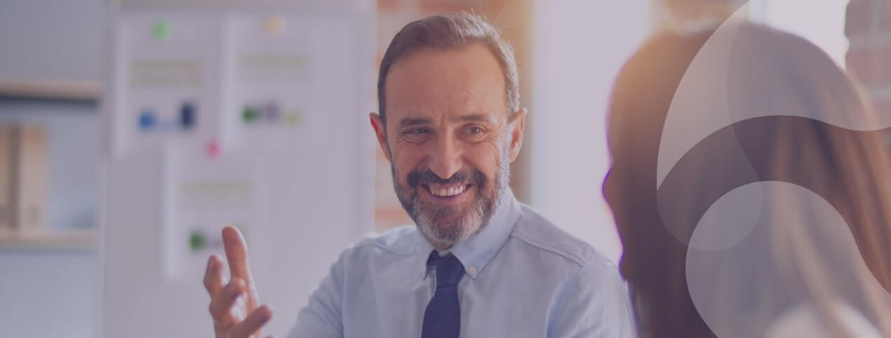 successful businessman chatting with his colleagues