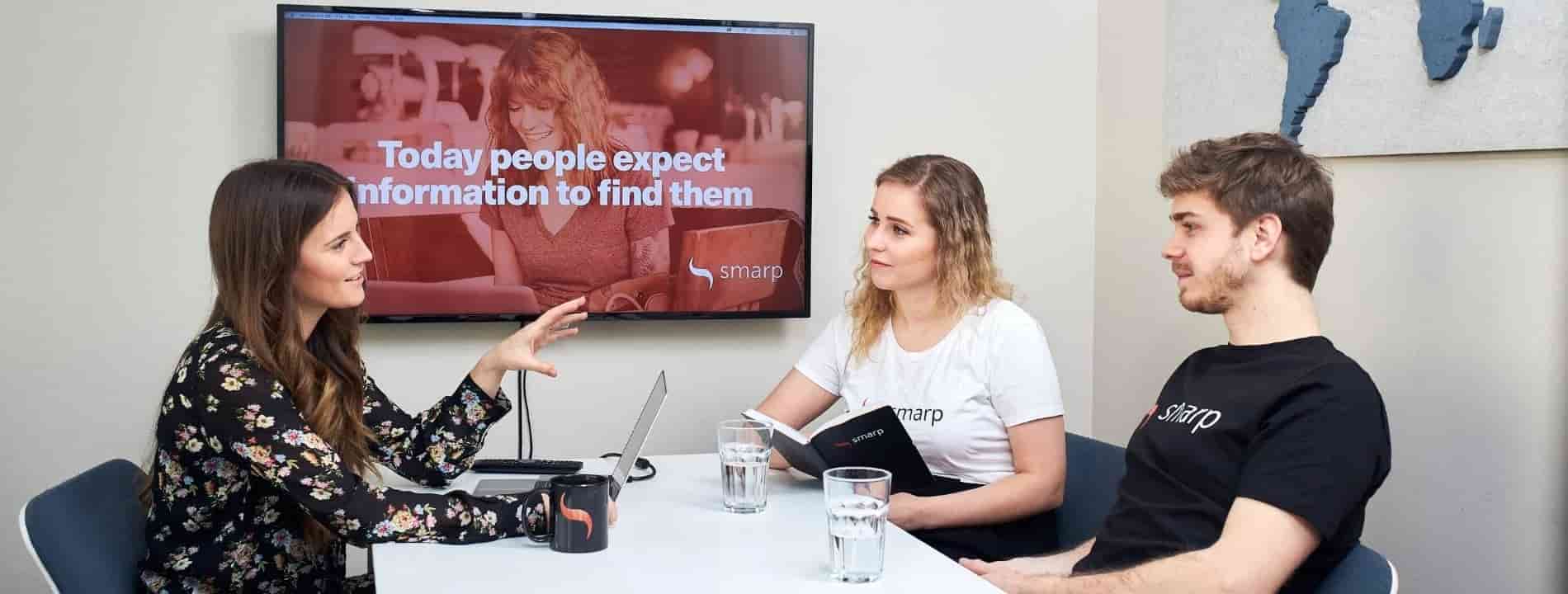 employees discussing ideas in a meeting